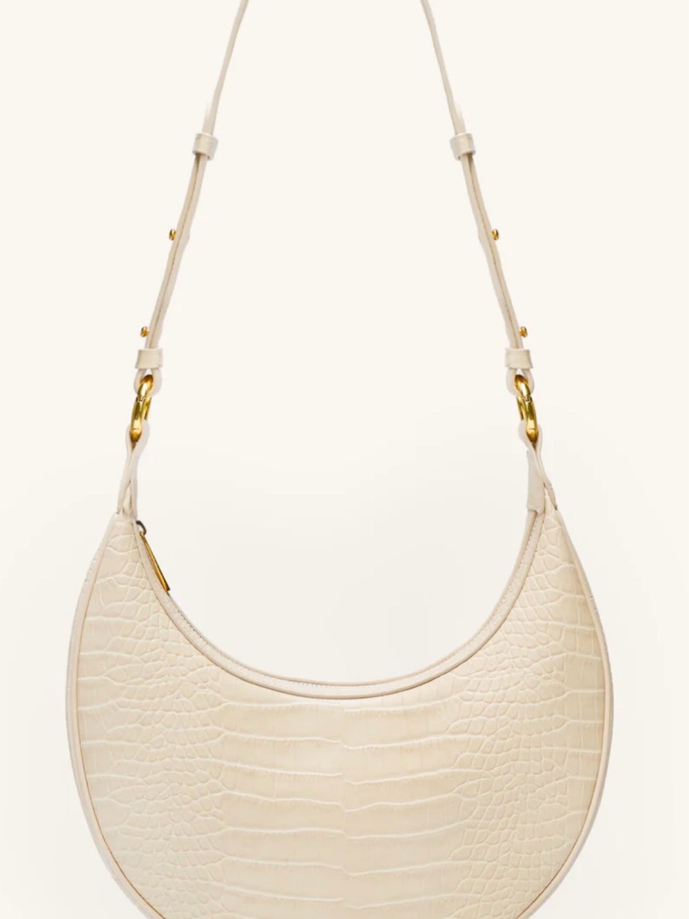 JW PEI Carly Saddle Bag in Ivory Croc vegan leather.